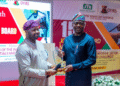 THE CHAIRMAN, FEDERAL INLAND REVENUE SERVICE, ZACCH ADEDEJI, SOUNDING A TALKING DRUM PRESENTED TO HIM BY GOVERNOR SEYI MAKINDE OF OYO STATE AT THE OPENING OF THE 157TH BOARD MEETING ON THE JOINT TAX BOARD (JTB) HELD AT THE JAG HOTEL IBADAN, OYO STATE, ON MONDAY.