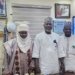 Coordinator of the Southwest Arewa Community, Alhaji Shehu Usman Jibril (centre), with HRH Alhaji Ahmed Haruna Kuraja (left), Chairman of the Arewa Chieftaincy Council in Alimosho, and Ibrahim Abubakar Jagaba (right), leader of the Arewa Community in Alimosho, during a courtesy visit at the Mile 12 International Market office, Lagos.